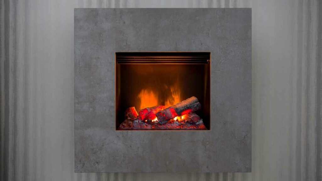 Gas fireplace Wall mounted. Fire brning. grey concrete fireplace surround.