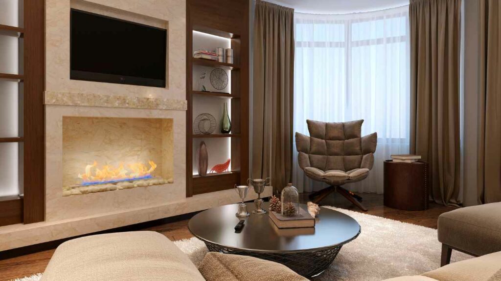 Cream marble fireplace. Tv above the fireplace. Shelving for books either side of the fireplace. large window and curtains. Bio ethanol flame on fire.