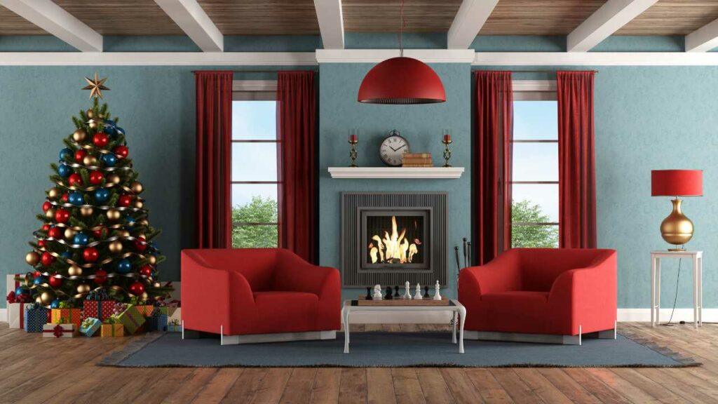 fireplace chimney decor with mantle and clock above the fireplace. two red lounge chairs either side of the fireplace.