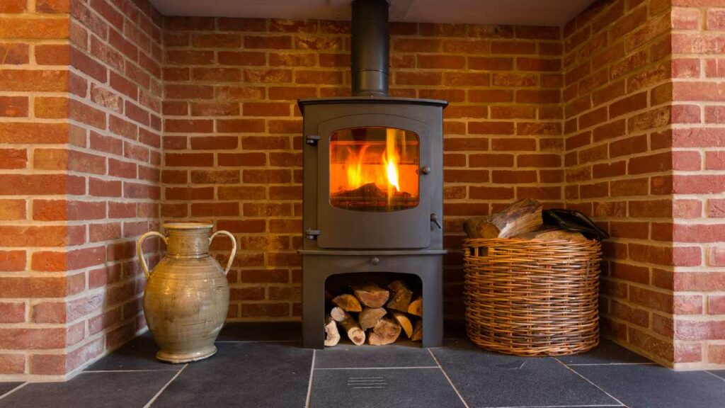 Wood burning stove with red brick back