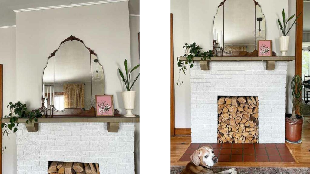 Empty fireplace and antique mirror. logs stacked in the fireplace. White fireplace surround and walls.