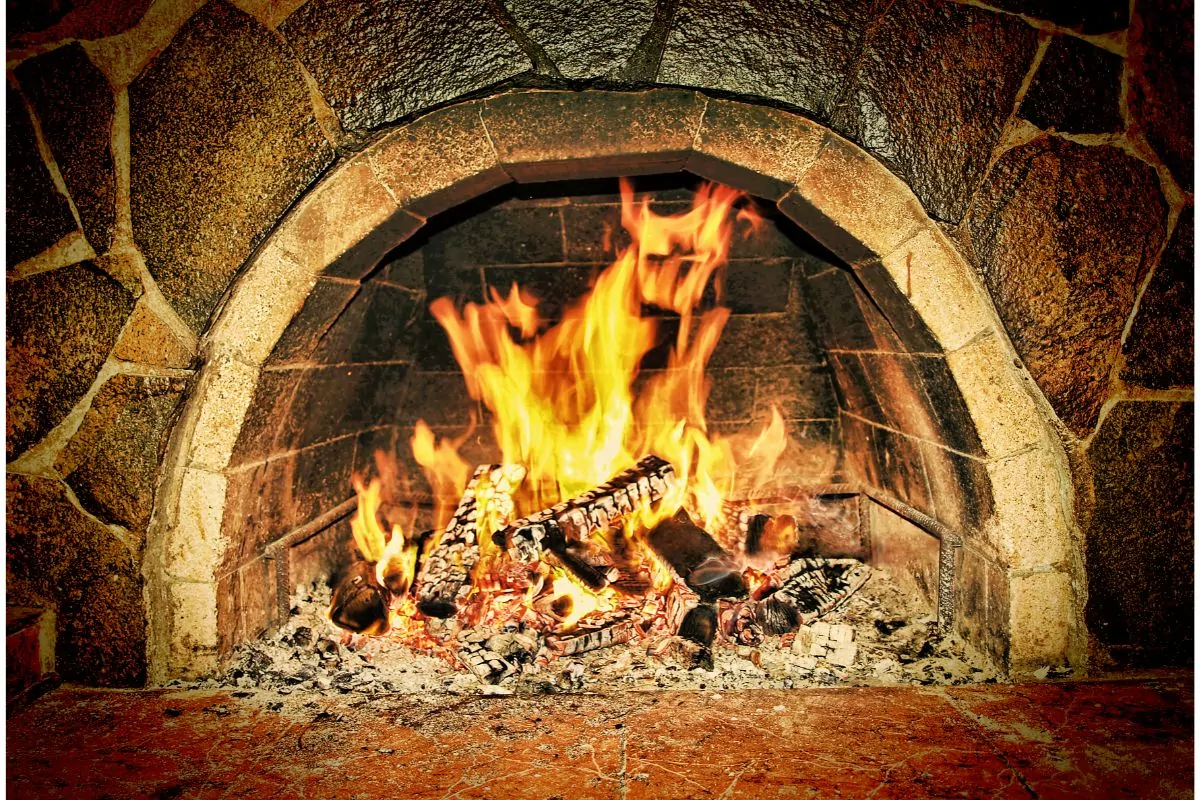 Wood burning fireplace with stone surround