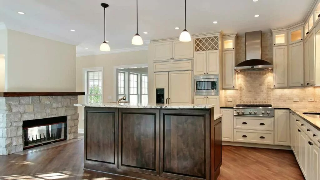 Wood burning kitchen fireplace. Double sided bwtween kitchen and living room.