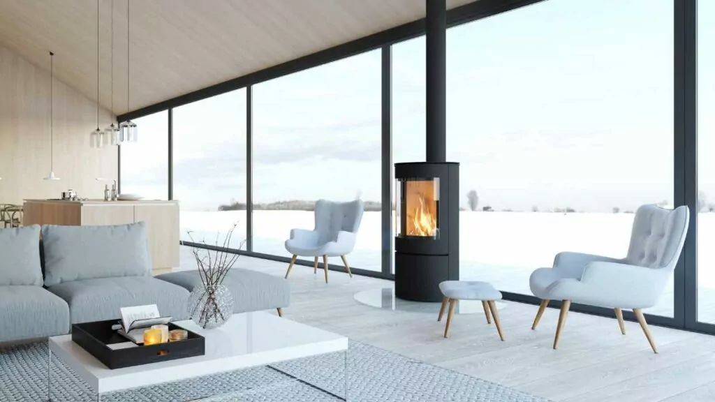Loft apartment wood burning fireplace. Very large windows. Flue exiting via ceiling. modern apartment.