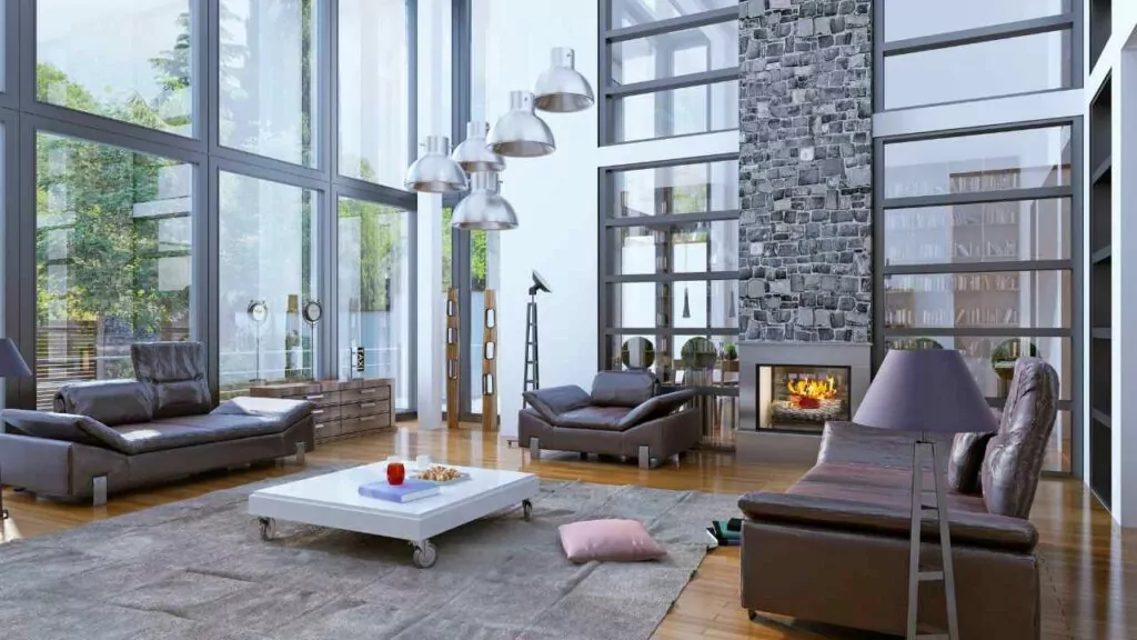 Large modern stone fireplace in a condo. very large windows. Wood flooring. Living room.